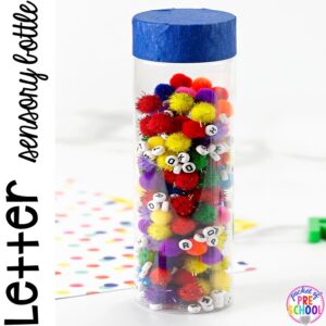 Letter Sensory Bottles (pompoms and letter beads) and a FREE letter hunt printable to make learning letters FUN for preschool, pre-k, and kindergarten.