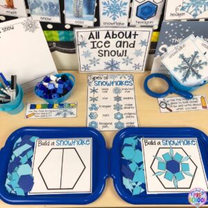 Ice and snow science table in a preschool classroom! explore and investigate snow and ice for a winter or polar animal theme. #preschool #prek #preschoolscience #iceexperiments #wintertheme