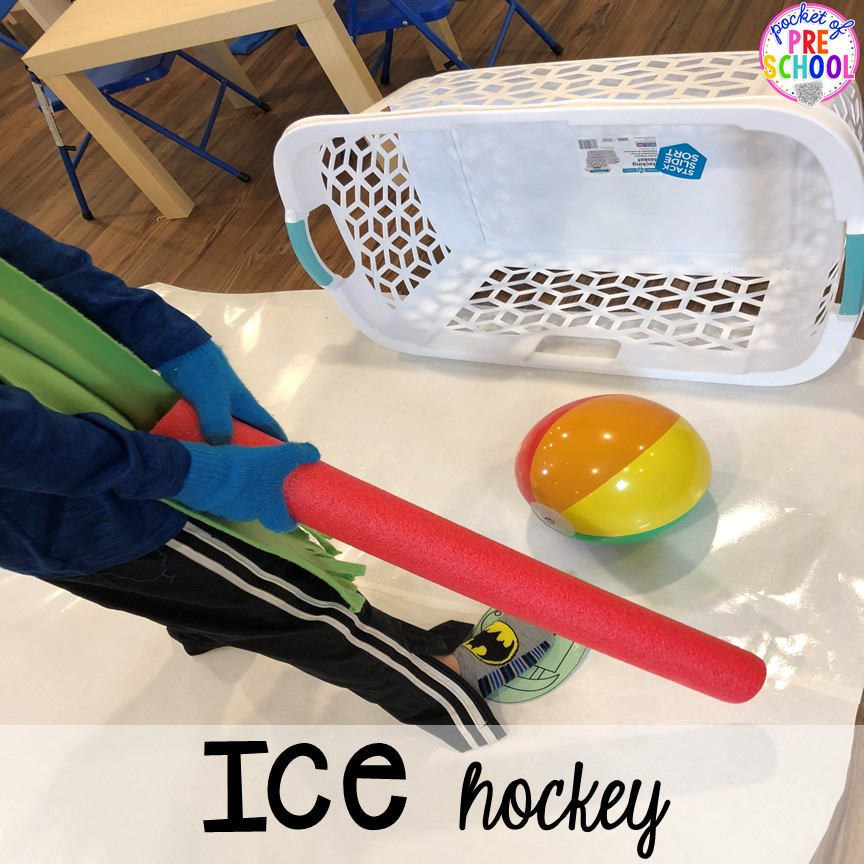 Play ice hockey with pool noodles (gross motor)! Plus more ides on how to make an Ice Skating Rink Dramatic Play. #dramaticplay #pretendplay #wintertheme #prek #preschool 