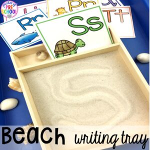 Beach writing tray! Ocean theme activities and centers for preschool, pre-k, and kindergarten (math, liteacy, sensory, fine motor, STEM). #oceantheme #preschool #prek #beachtheme