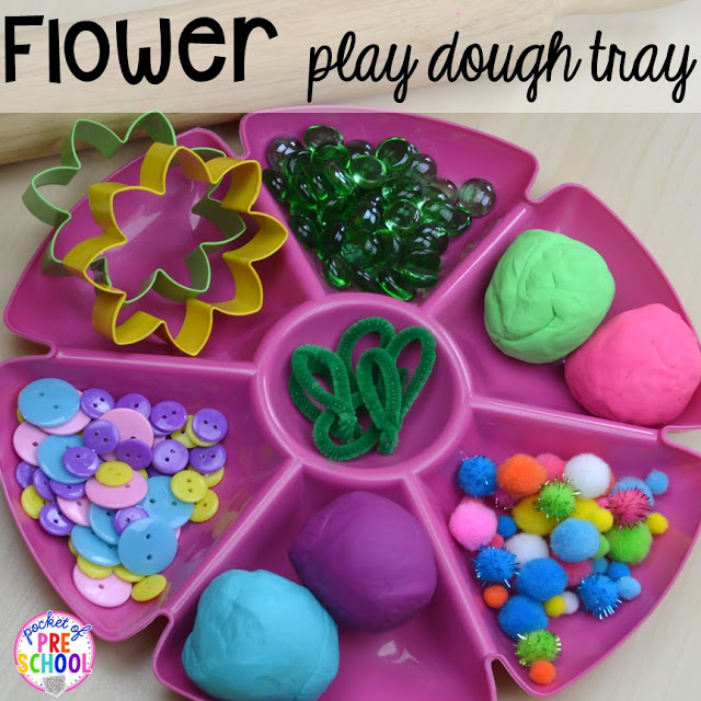 Flower play dough tray for a spring theme plus Plant Needs and Life Cycle Posters FREEBIE. Prefect for preschool, pre-k, and kindergarten.