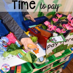 Time to pay! Flower Shop Dramatic Play for a spring theme, Mother's Day theme, or summer theme when everything is growing and blooming. Any preschool, pre=k, and kindergarten kiddos will LOVE it (and learn a ton too). #flowershop #gardenshop #presschool #prek #dramaticplay