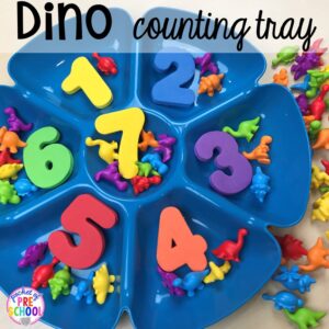 Dinosaur counting tray plus tons of dinosaur themed activities & centers your preschool, pre-k, and kindergarten students will love! #preschool #pocketofpreschool #dinosaurtheme