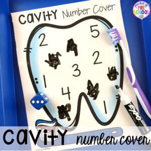 Tooth cavity number game! Dental health themed activities and centers for preschool, pre-k, and kindergarten (FREEBIES too) #dentalhealththeme #preschool #pre-k #tooththeme