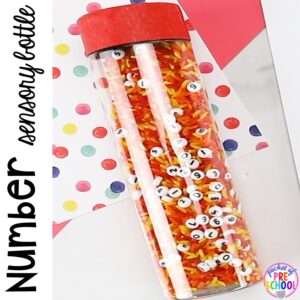 Number sesnory bottles with number beads and FREE Number Hunts! Fun number recognition game for preschool, pre-k and kindergarten.