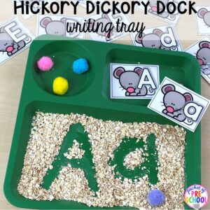Hickory Dickory Dock writing tray! Favorite Nursery Rhyme activities and centers for preschool, pre-k, and kindergarten. #nurseryrhymes #preschool #prek #kindergarten