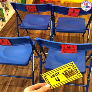 Number match seats and tickets! How to change the dramatic play center into a Fairy Tale Theater for a fairy tale theme or reading theme. #dramaticplay #pretendplay #preschool #prek #kindergarten
