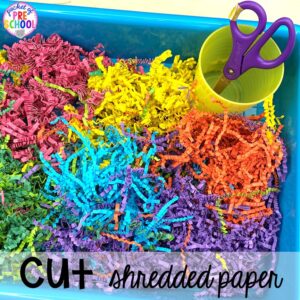 Shredded paper cutting sensory bin! Plus more scissor skills activities for cutting practice for preschool, pre-k, and kindergarten with FREE cutting printables. #scissorskills #cuttingpractice