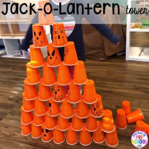 Jack-O-Lantern cup stack! 15 Classroom Halloween Party Ideas for preschool to 2nd grade! Halloween party games, snacks, and helpful tips.