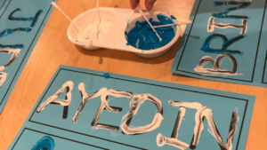 Name writing activity with qtips and paint for preschool, pre-k, and kindergarten students.