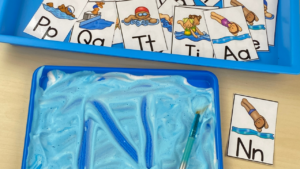Create a pool/summer writing sensory tray for preschool, pre-k, and kindergarten students.