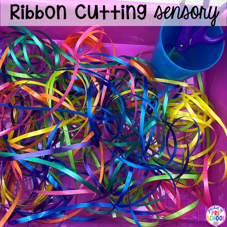 Ribbon cutting sensory play perfect for the holidays or for cutting practice. Plus 55 more sensory ideas for preschool, pre-k, and kindergarten students.