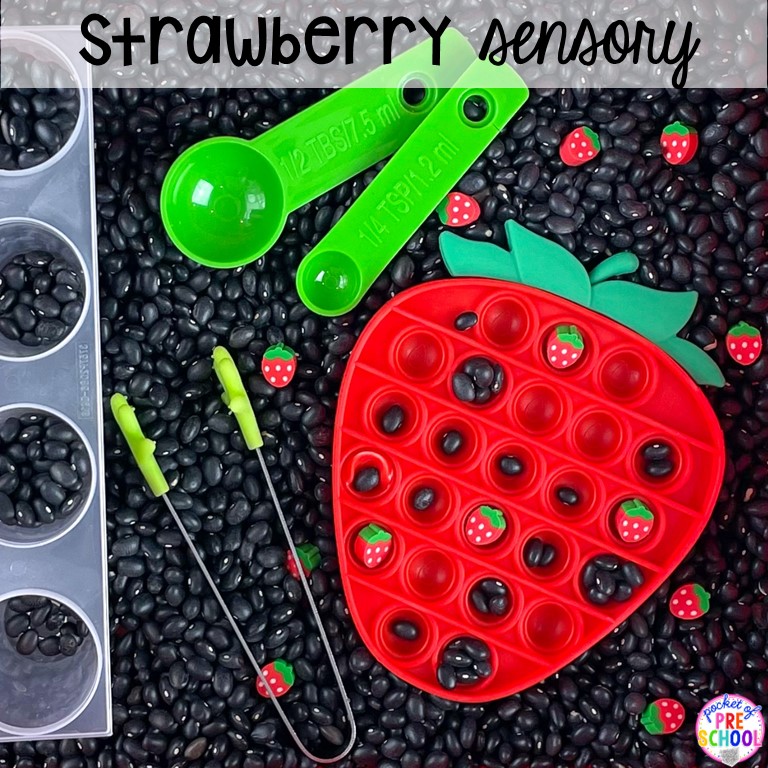 Strawberry sensory bin for a fruit, grocery store, or food theme. Plus 55 more sensory ideas for preschool, pre-k, and kindergarten.
