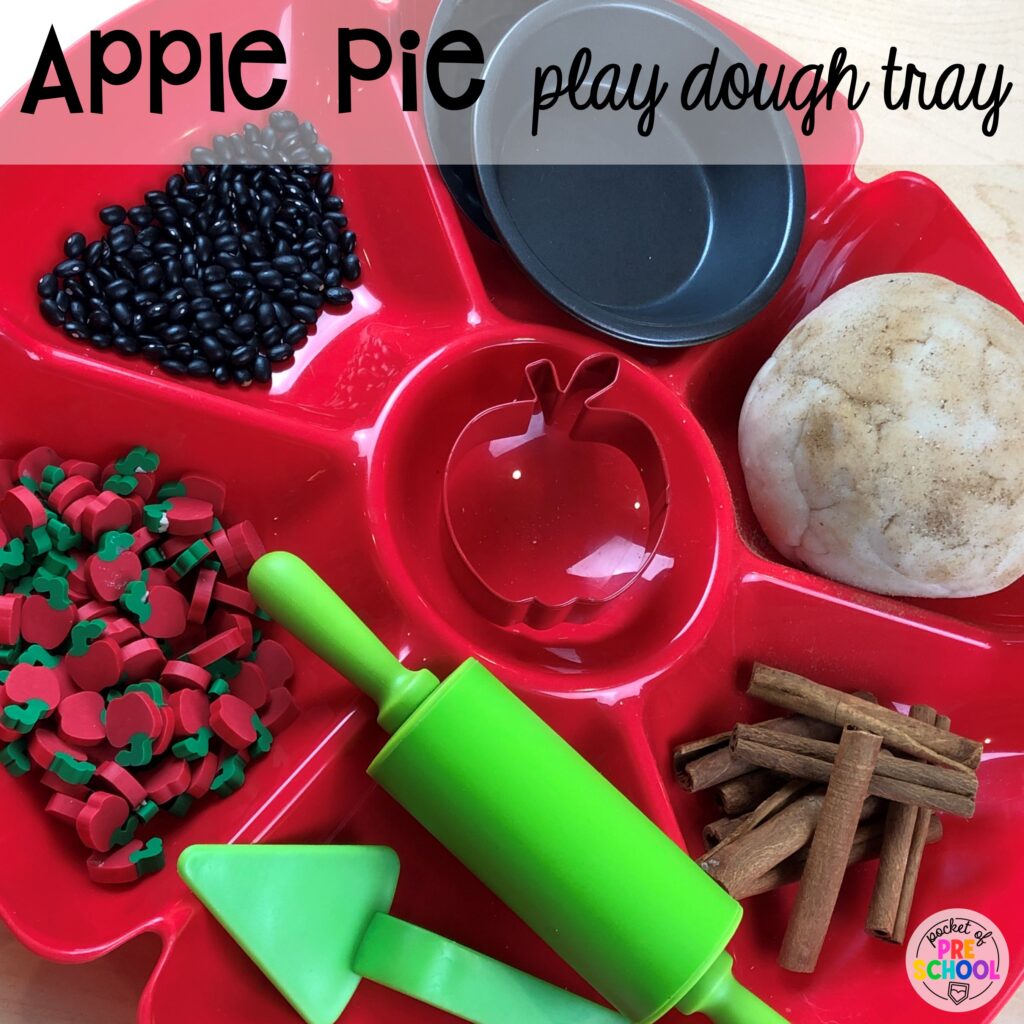 Apple pie play dough tray for a fun apple-themed sensory play idea. Check out over 50 play dough trays for preschool, pre-k, and kindergarten students.