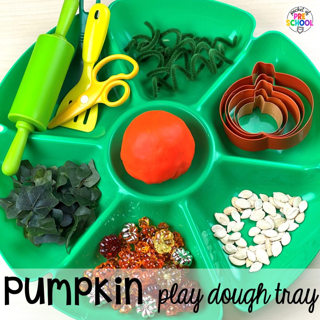Pumpkin play dough tray for students to increase fine motor strength, develop language skills, and more. Check out over 50 play dough trays for preschool, pre-k, and kindergarten students.