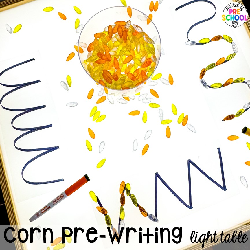 Corn pre-writing activity plus Fall Light Table Activities designed for preschool, pre-k, and kindergarten students to learn and develop in a hands-on way.