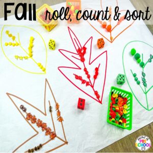 Fall Roll, Count, & Sort plus more math butcher paper activities for preschool, pre-k, and kindergarten students to move and explore while learning.